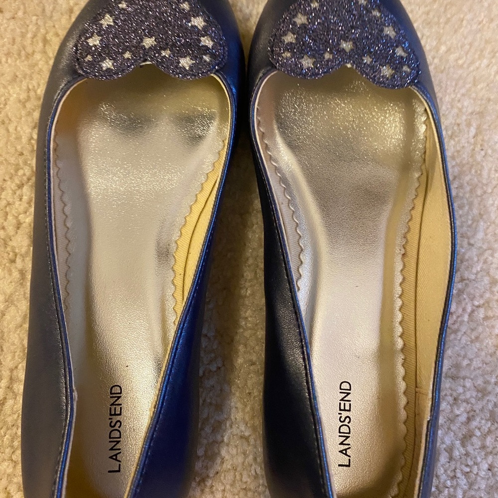 Girls land in purpleish blue slip on flat shoes